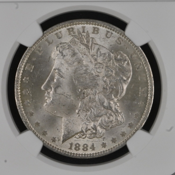 MORGAN DOLLAR 1884-O $1 Silver graded MS63 by NGC